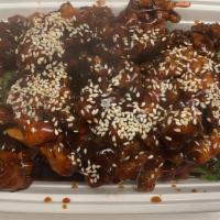Sesame Beef · Deep fried breaded beef in General Tso sauce with sesame seeds.