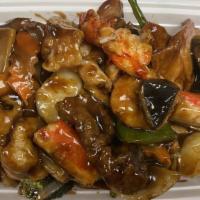 Happy Family · Lobster meat, imitation crab meat,  shrimp, scallops, beef, chicken, roast pork sautéed with...