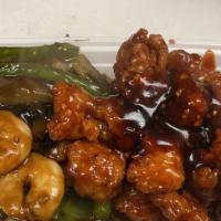 Dragon & Phoenix · Spicy. Spicy Half General Tso Chicken and Half Shrimp with mixed vegetables.