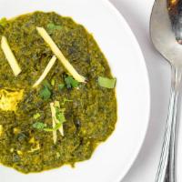 Palak Paneer · Soft traditional homemade cottage cheese cubes tossed into a thick, creamy, rich pureed spin...