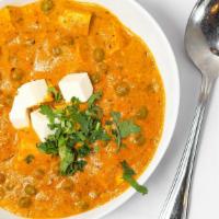 Mattar Paneer · Soft traditional homemade cottage cheese cubes and fresh peas cooked in a delicious, flavorf...