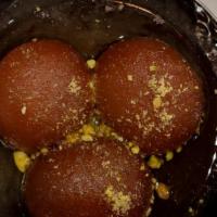 Gulab Jamun · Warm, deep - fried doughnuts made from milk solids dipped in a traditional simple syrup infu...