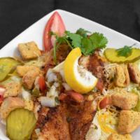 Fried Fish Salad
 · Fried fish, lettuce, tomatoes , pickles, croutons and cheese served with pico and a choice o...