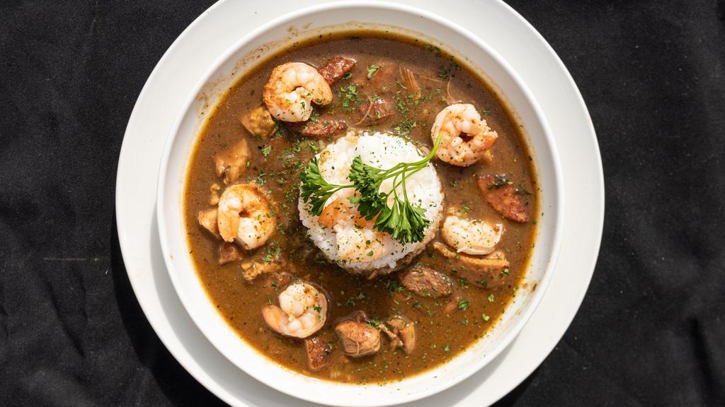 Seafood Gumbo · Gumbo consisting of fish, shrimp and crawfish tails served over rice.