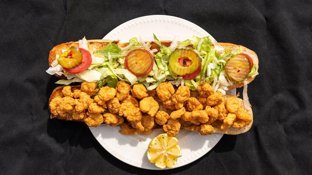 Shrimp Po-Boy
 · Dressed with mayo, lettuce, tomatoes, and pickles served on French bread.