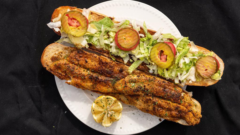 Cajun Fish Po-Boy
 · Dressed with mayo, lettuce, tomatoes, and pickles served on French bread.