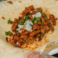 Burrito · Choice of meat+
Flour tortilla, beans, rice, cilantro , onion
