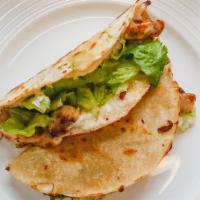 Real Quesadilla · Choice of meat+
Grilled handmade tortilla, cheese, sour cream, lettuce