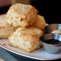 Buttermilk Biscuits · Scratch-made biscuits served with house-churned North Dakota honey butter and seasonal prese...