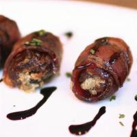 Blue Cheese Bacon Dates · Four bacon-wrapped dates stuffed with blue cheese. Roasted and finished with a sweet balsami...