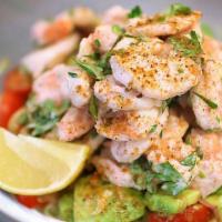 Shrimp Louie Salad · Shrimp on a bed of shredded iceberg lettuce with julienned red onion, whole cherry tomatoes,...
