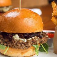 Blue Cheese Balsamic Bacon Burger · Topped with blue cheese, balsamic onions, bacon, arugula, and pickle mayo tartar sauce. Serv...
