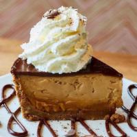 Virginia Peanut Butter Mousse Pie Slice · Creamy peanut butter mousse in a pecan, graham cracker crust with chocolate ganache, house-r...