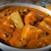 Mole Amarillo · Yellow mole from oaxaca, cooked with chayote, (masa dumplings) and chicken. Served with and ...
