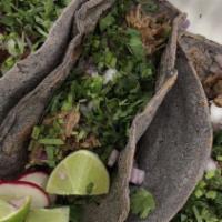 Tacos · Made with fresh organic blue com tortilla with your choice of meat topped with cilantro and ...