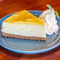 Seasonal Cheesecake By Pie Snob · Vanilla cream, mint sprig