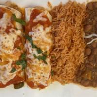 Enchiladas  · Two flour tortillas covered with melted cheese served with Mexican rice, refried  beans, gua...