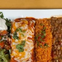 Burritos  · A flour tortilla covered with melted cheese Served with Mexican rice, refried beans, Guacamo...