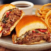 Carve French Dip* · Smoked NY Strip sliced and topped with caramelized onions, bell peppers and Gruyere cheese i...