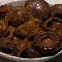 Sauteed Burgundy Mushrooms · Cremini mushrooms sautéed in Burgundy wine, chicken stock, herb-garlic butter and diced yell...