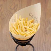 French Fries · Thin-Cut French fries seasoned with Kosher salt and served with a side of Sriracha ketchup.