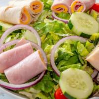 Chef Salad · Romaine Lettuce, Deluxe Ham, Oven Roasted Turkey, American Cheese, Diced Tomatoes, Cucumbers...