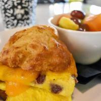 Breakfast Sandwich · Served on a house-made buttermilk biscuit with egg, cheese, & your choice of bacon, ham, or ...