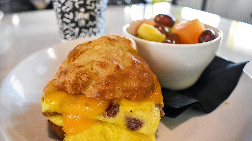 Breakfast Sandwich · Served on a house-made buttermilk biscuit with egg, cheese, & your choice of bacon, ham, or avocado