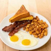 Traditional Breakfast · 2 eggs, bacon or sausage, breakfast potatoes, choice of toast.