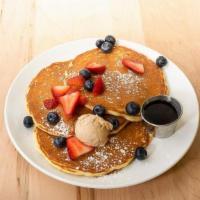 Buttermilk Pancakes · 3 pancakes, fresh berries, maple syrup, cinnamon butter. add blueberry, chocolate chips, gra...