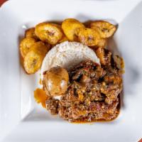 Designer Rice Meal · Spicy stew fried in palm oil and served with assorted meat, boiled egg, and plantain over wh...