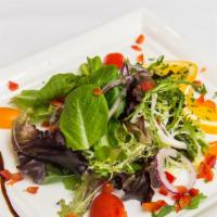 Salada Mista · Mesclun mix greens, red onion, tomato tossed with house vinaigrette.