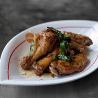 8) Kaprow Wings * · fried marinated chicken wings, basil-garlic sauce