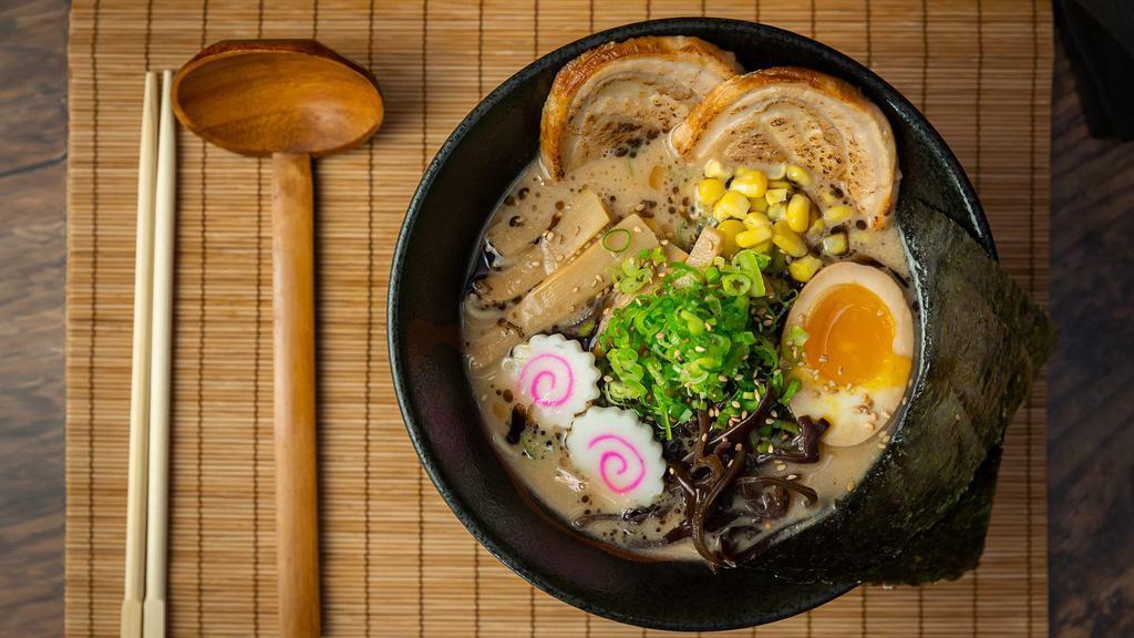 Tonkotsu Miso Ramen · Skinny Noodle with Chashu, Stir-fried beansprouts with Pork, Soft-boiled Egg, Scallions, Corn, Fish Cake, Bamboo Shoots, Woodear, Nori, Spicy Oil with Paste and black garlic oil with Pork Broth. (Saltier, Thicker Broth)