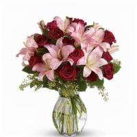 Lavish Love Bouquet With Long Stemmed Red Roses · Best seller. Lovely reds and pinks come together in this lavishly romantic anniversary gift....