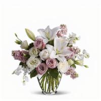 Teleflora'S Shimmering White Bouquet · All is calm, all is white in this exquisite bouquet featuring white roses, lilies, alstroeme...