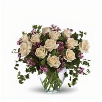 Victorian Romance · Romance blossoms beautifully within this elegant bouquet. The serenity and innocence of crea...