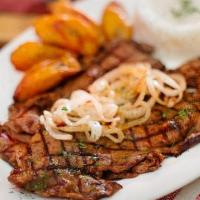 Bistec Encebollado · Grilled Steak with Sauteed Onions