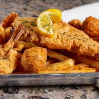 Catfish Platter · Catfish. 2 Large Golden Fried Catfish Fillets served with 3 hush puppies, Seasoned Fries and...