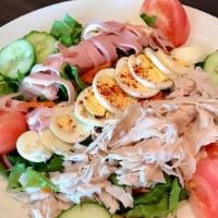 Chef Salad · Turkey, ham, cheese, hard boiled egg, . lettuce, tomatoes, green peppers, cucumbers, red oni...
