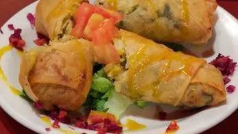 The Soul Roll · (2) smoked turkey and Southern-style collards in a crispy spring roll served with sweet chil...