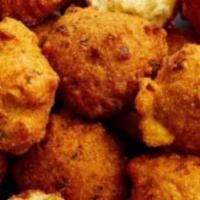 Hush Puppies · Southern style served with sweet whipped honey butter.