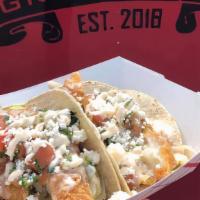 Chicken Tinga Tacos (3) · Braised chicken, shredded cabbage, Pico, chipotle crema, queso, on corn tortillas served wit...