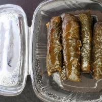 Dolma · Grape leaves stuffed with rice, onions, parsley and spices.