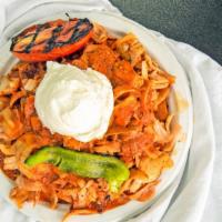 Chicken Iskender · Thinly sliced chicken tender with sauteed pita bread, thick yoghurt, grilled tomatos, pepper...