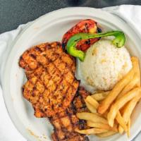 Grilled Chicken Kebab · Special marinated, boneless, skinless leg and breast on grill with rice,  greens, grilled to...