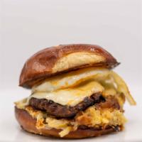 Eggstasy Sandwich · Our signature breakfast sandwich! A cheesy hash brown casserole base with juicy beef sausage...