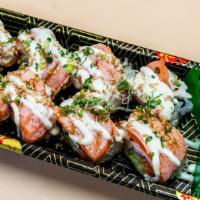 ​Salmon Lover · Sushi rice, wasabi mayo, seared salmon,spicy salmon, cucumber, green onion,sesame seed, seaw...
