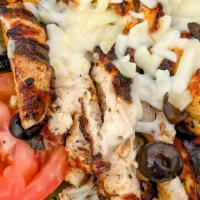 Mediterranean Salad · Topped with grilled chicken tenders and shredded cheese.