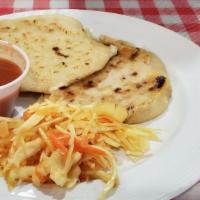 Pupusas · Pilow corn tortilla it could be stuffed with cheese.
Refried bean pork or Loroco..